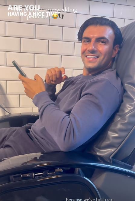 Ercan Ramadan is sitting on a leather chair in the spa area