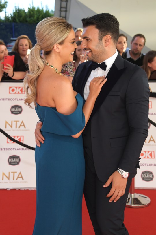 Vicky Pattison and Ercan Ramadan hug on the red carpet